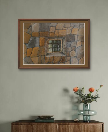 Window in stone wall by Craig Stronner